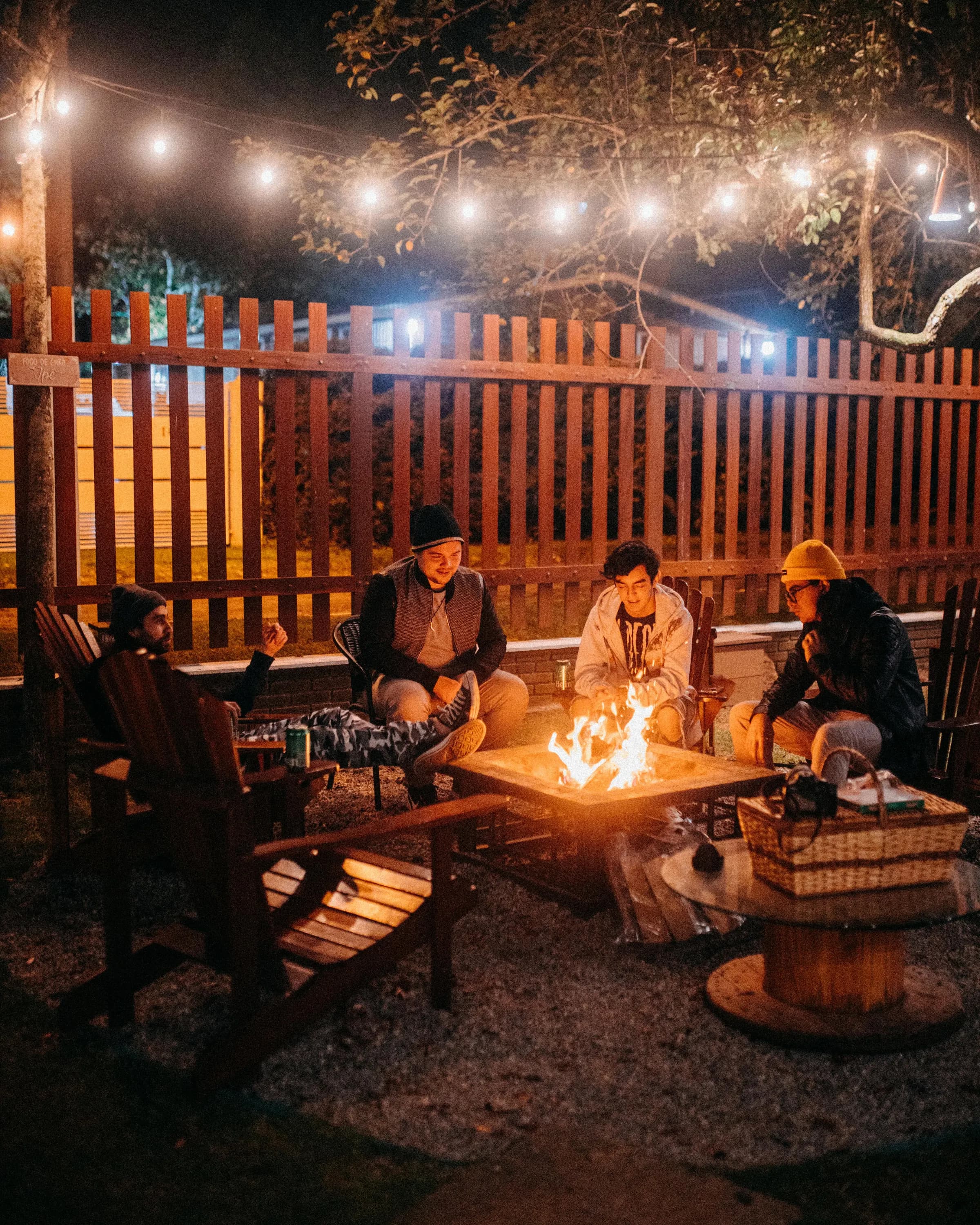 Outdoor seating with ambient lighting on an autumn evening